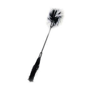 Ostor és cirógató egyben (fekete-fehér) Ostor és cirógató egyben (fekete-fehér)